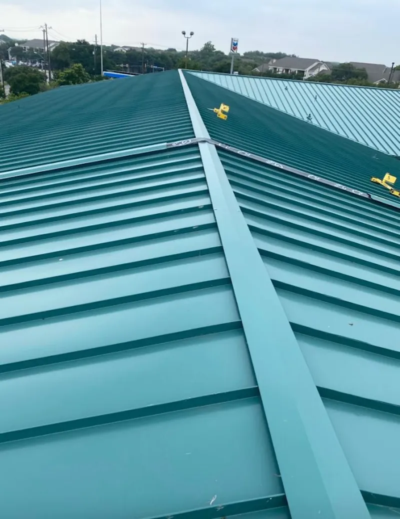 Green commercial metal roof ridge and valley for Metal Roof Repair in Swanton