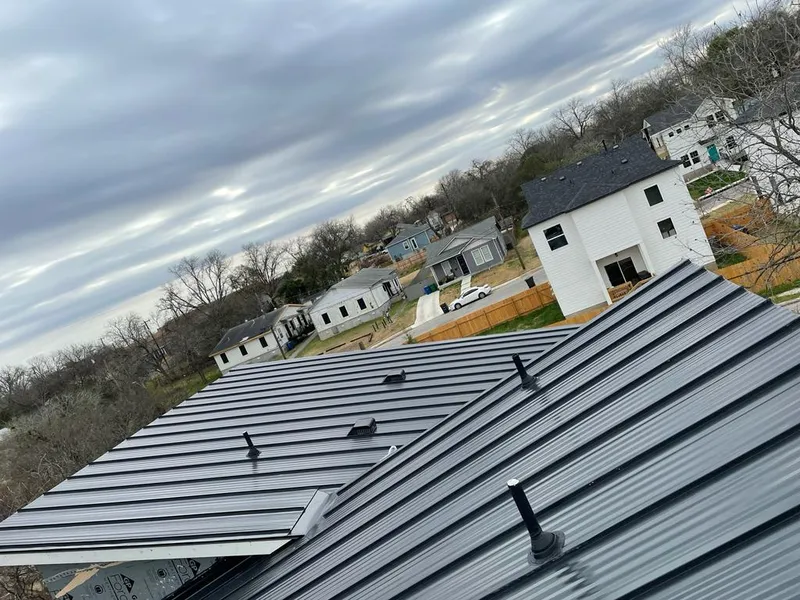 Standing seam metal roof panels with vents for Skylight Repair in Swanton